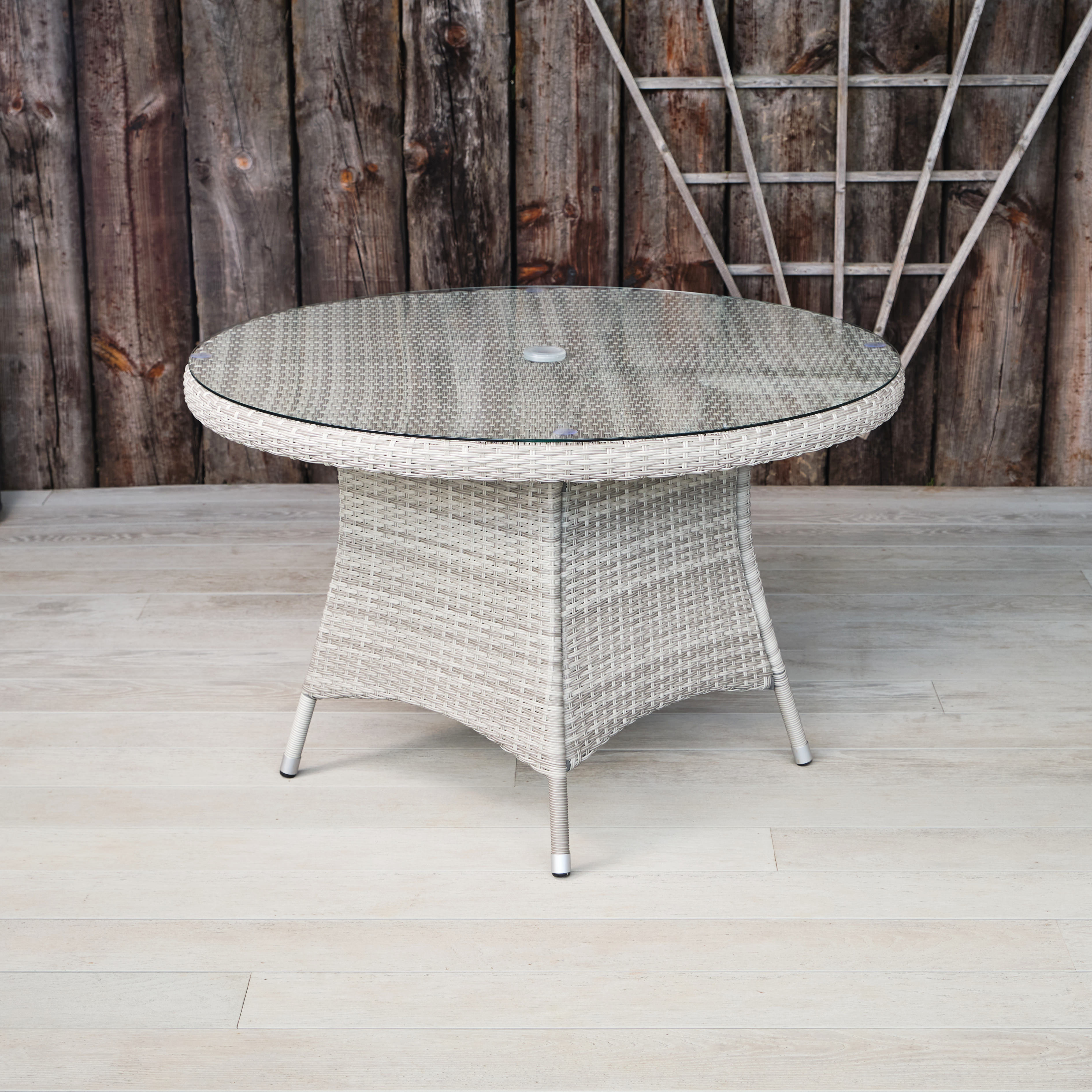 round grey rattan table