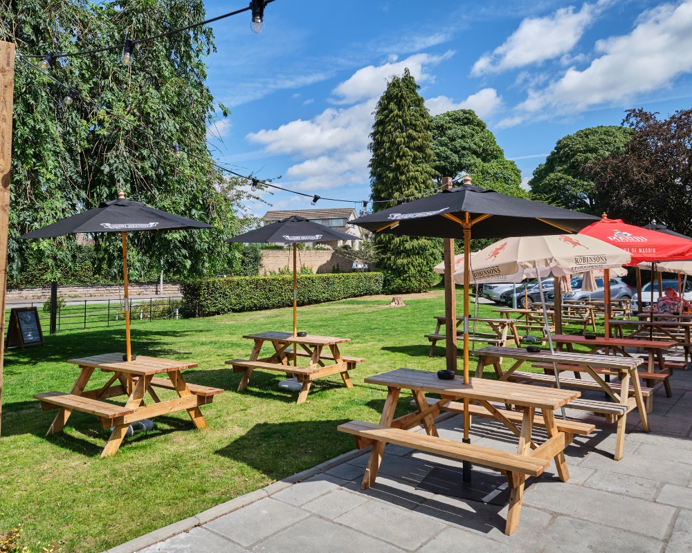 Pub Picnic Benches on a patio and lawn area