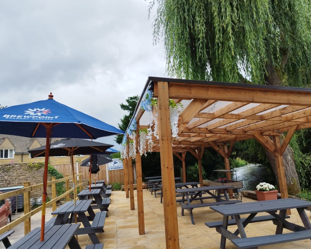 Pub Picnic Benches under a pergola