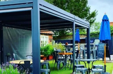 A luxury metal gazebo in a pub garden