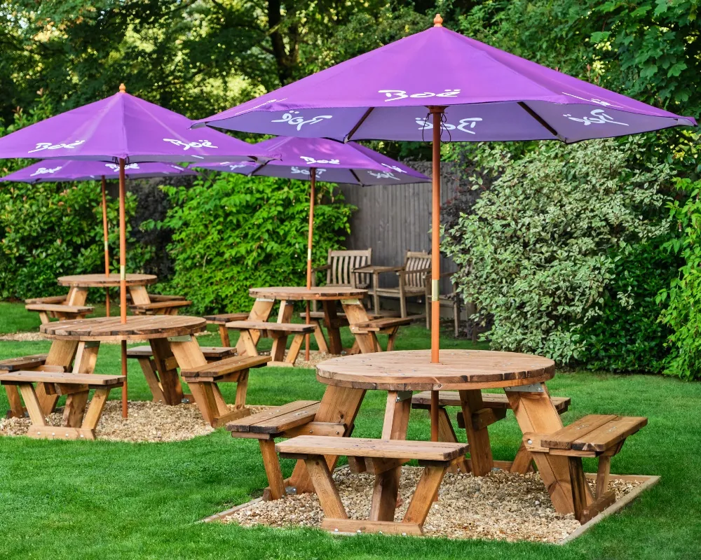 Pub Picnic Benches with purple parasols